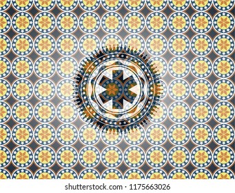 emergency cross icon inside arabesque emblem. arabic decoration.