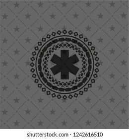 emergency cross icon inside black emblem