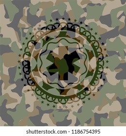 emergency cross icon inside camouflage emblem