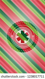 emergency cross icon inside christmas colors style emblem.