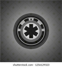 emergency cross icon inside dark badge or emblem