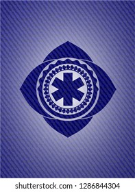 emergency cross icon inside denim background