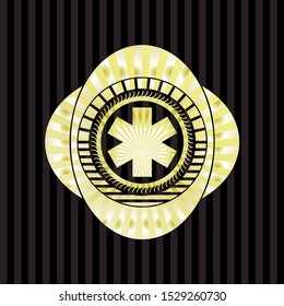 emergency cross icon inside gold shiny badge