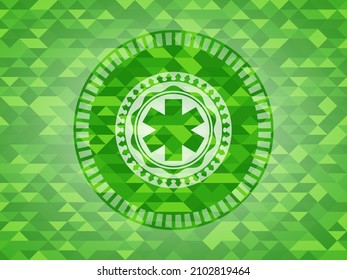 emergency cross icon inside green mosaic emblem. 