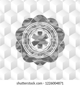 emergency cross icon inside grey emblem with cube white background