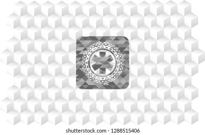 emergency cross icon inside grey emblem with geometric cube white background