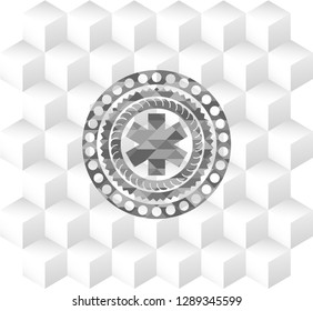 emergency cross icon inside grey emblem with geometric cube white background