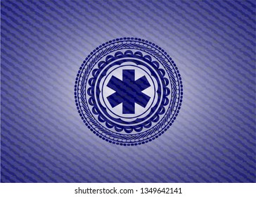 emergency cross icon inside jean background