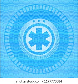 emergency cross icon inside light blue water wave style emblem.
