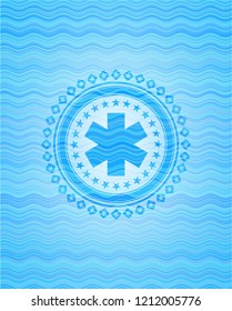 emergency cross icon inside light blue water wave style badge.