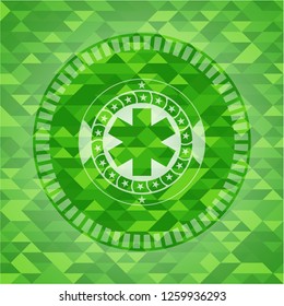 emergency cross icon inside realistic green mosaic emblem