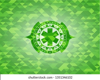emergency cross icon inside realistic green emblem. Mosaic background