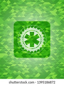 emergency cross icon inside realistic green mosaic emblem