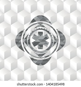 emergency cross icon inside realistic grey emblem with geometric cube white background