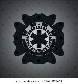 icono de la cruz de emergencia dentro de un emblema negro realista