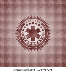 emergency cross icon inside red seamless geometric emblem.