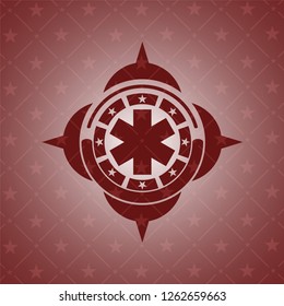 emergency cross icon inside red emblem