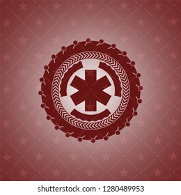 emergency cross icon inside red emblem