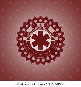 emergency cross icon inside red emblem