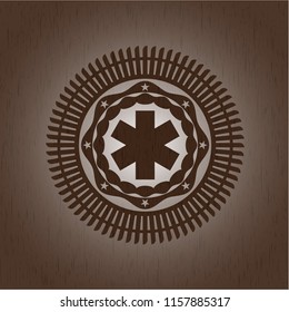 emergency cross icon inside retro style wood emblem