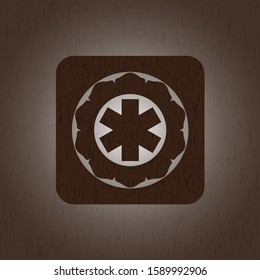 emergency cross icon inside retro style wood emblem