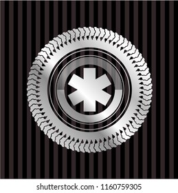 emergency cross icon inside silver shiny badge