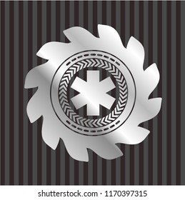 emergency cross icon inside silver shiny emblem