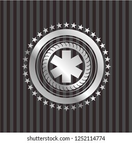 emergency cross icon inside silver shiny emblem