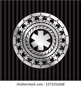 emergency cross icon inside silver badge or emblem