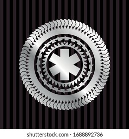 emergency cross icon inside silver emblem or badge