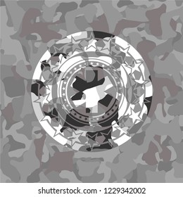 emergency cross icon on grey camouflaged pattern