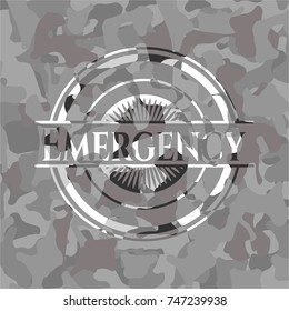 Emergency on grey camouflage texture