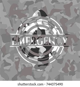 Emergency on grey camouflaged texture