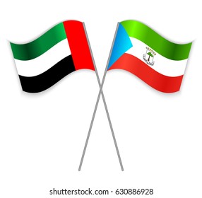 Emirian and Equatorial Guinean crossed flags. United Arab Emirates combined with Equatorial Guinea isolated on white. Language learning, international business or travel concept.