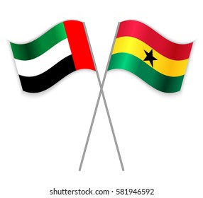 Emirian and Ghanaian crossed flags. United Arab Emirates combined with Ghana isolated on white. Language learning, international business or travel concept.