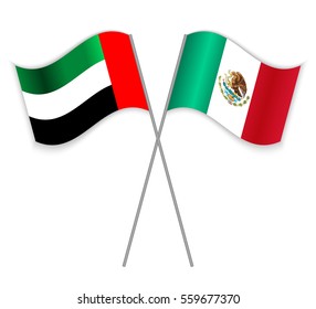 Emirian and Mexican crossed flags. United Arab Emirates combined with Mexico isolated on white. Language learning, international business or travel concept.
