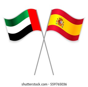 Emirian and Spanish crossed flags. United Arab Emirates combined with Spain isolated on white. Language learning, international business or travel concept.