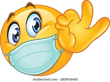Emoji emoticon with medical mask over mouth showing ok sign
