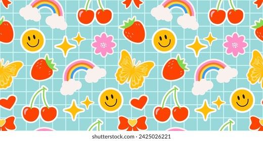 Emoji sobre un fondo azul a cuadros. Patrón de los niños con elementos brillantes en forma de pegatinas. Bonito patrón hippie. Etiquetas. Arco iris, flor, chispa, mariposa, cereza y sonrisa.