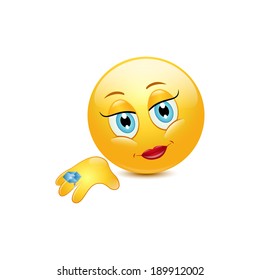 Emoticon girl with ring on a white background