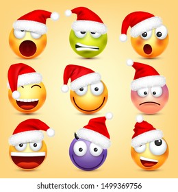 Emoticon vector set. Yellow face with emotions and Christmas hat. New Year, Santa. Winter emoji. Sad, happy, angry faces. Funny cartoon character mood. 