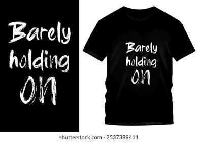 Emotive Grunge Typography T-Shirt Design - "Barely Holding On" Distressed Text Graphic on Black Background for Resilience and Mental Health Awareness Fashion