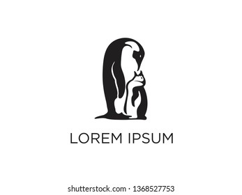 emperor penguin logo. penguin family .This logo explains the love of parents for their children and family harmony.
