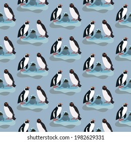 Emperor penguins and baby seal on an ice berg. Designed in seamless repeat pattern. Ready to be printed on fabric, wall paper or children's bedding products.
