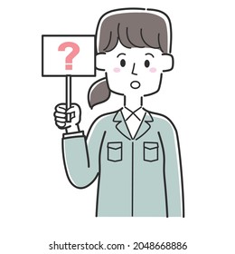 An employee of a construction shop holding a tag with Hatena written on it