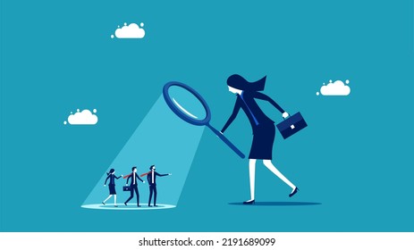 Employee performance assessment. Manager woman use a magnifying glass to analyze employees