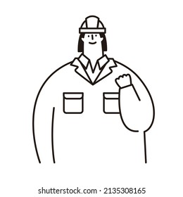 An employee wearing a helmet. She grabbed her fist and expressed her joy.