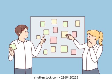 Employees brainstorm engaged in creative thinking in office. Businesspeople work with sticker planning tasks together at meeting. Teamwork concept. Vector illustration. 