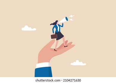 Empower or encourage employee to speak out, talk or discuss to solve business problem, listening to feedback or opinion concept, giant hand help businesswoman employee to speak out with megaphone.