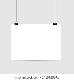 Empty A4 sized paper frame mockup hanging with paper clip